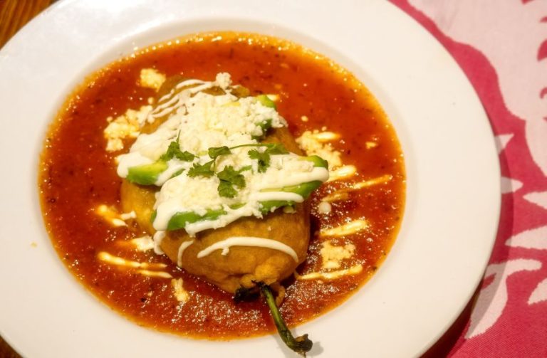 Seafood Chile Relleno in Las Vegas served at La Neta Cocina y Lounge, featuring lobster, shrimp, cheese blend, and chile ranchero sauce.
