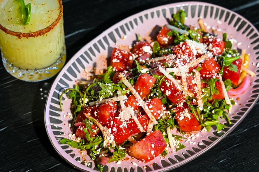 Watermelon salad in Las Vegas at La Neta Cocina y Lounge featuring fresh watermelon, manchego cheese, jicama, and chile lime vinaigrette.