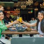 What defines a modern Mexican restaurant experience in Las Vegas? Guests enjoying cocktails and elevated dining at La Neta.
