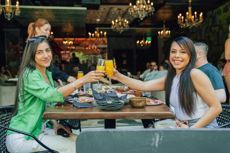 What defines a modern Mexican restaurant experience in Las Vegas? Guests enjoying cocktails and elevated dining at La Neta.